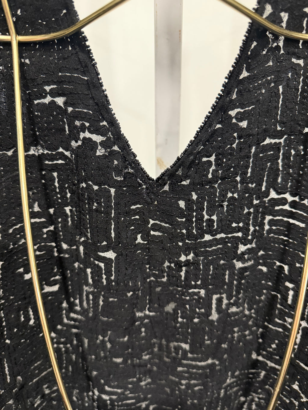 Black sequined halter top