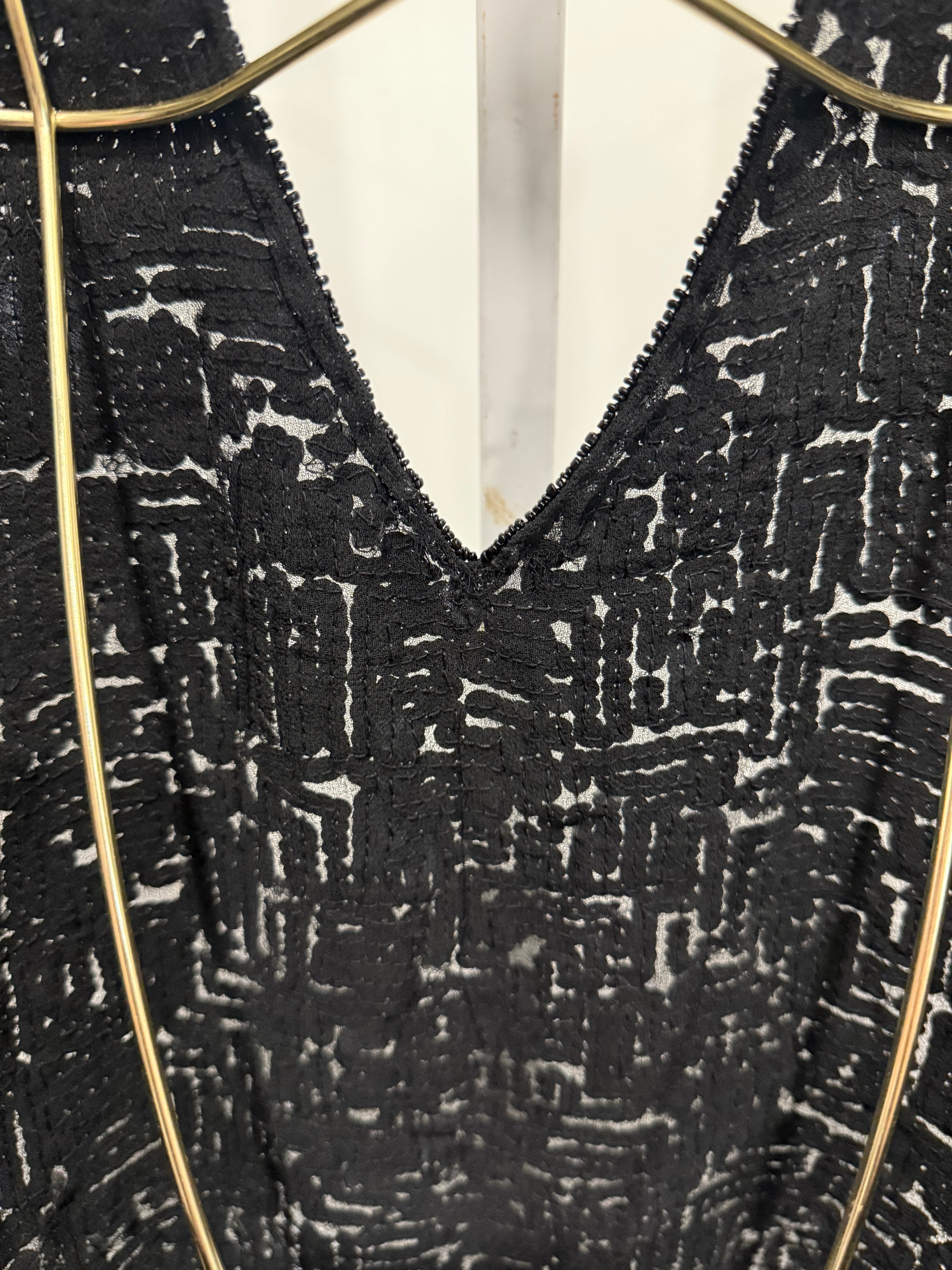 Black sequined halter top